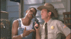 pootie_tang_with_sheriff.gif
