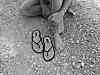 Kylas_feet_and_flip_flops_black_and_white.jpg